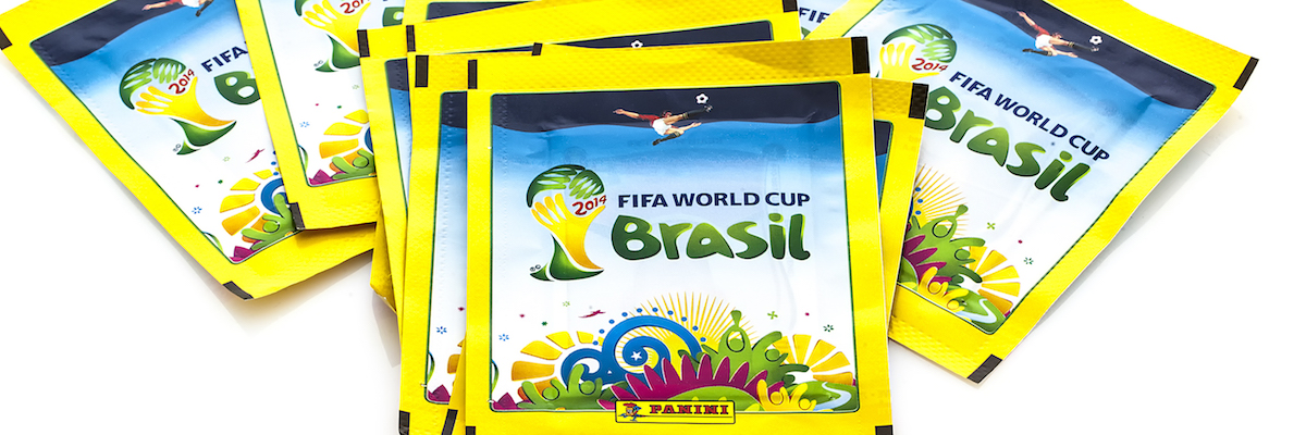 SWINDON, UK - APRIL 5, 2014: Panini FIFA World Cup 2014 Stickers on a white background